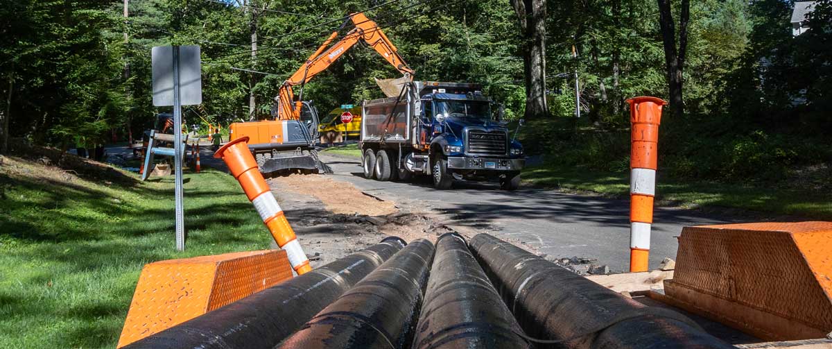 Crew replacing water main in Avon.