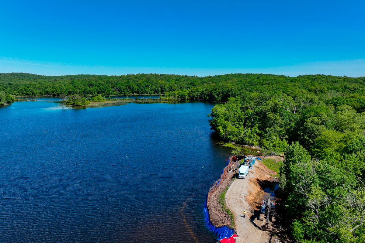A construction crew works at Connecticut Water's Turkey Hill Reservoir.