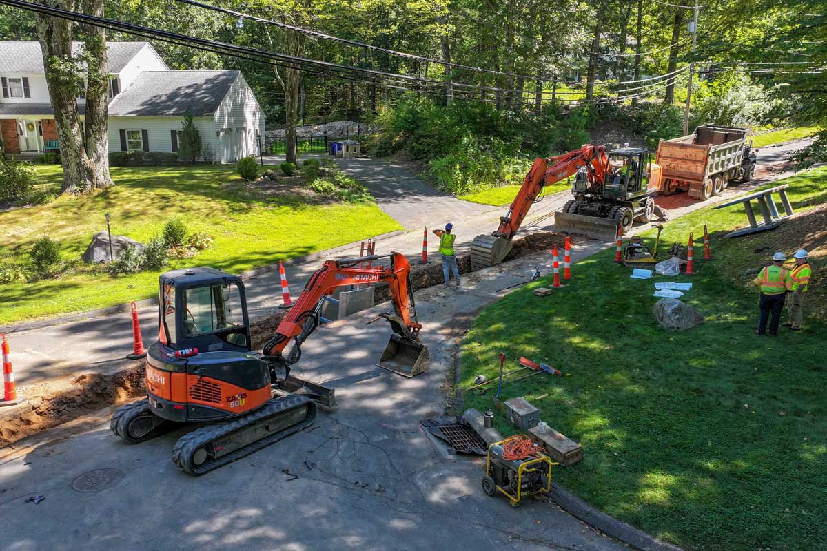 Crew replacing water main in Avon.